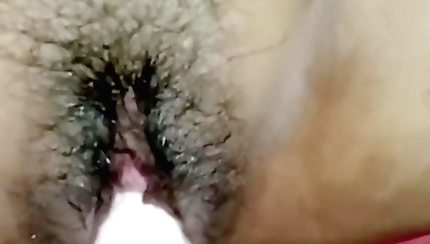 Indian hottie with a hairy pussy is showing off her body