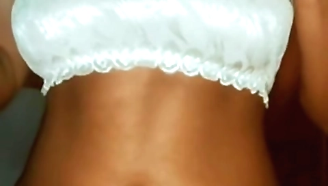 Brunette in a red lingerie is getting a handjob from a dude