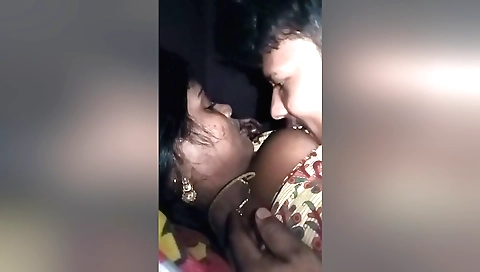 Amateur brunette with large and round breasts gets naked