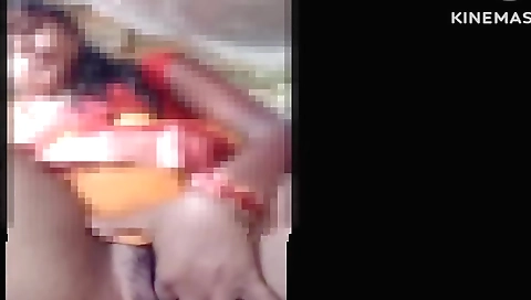 Indian brunette in a sexy outfit fingered her big boobs