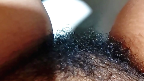 Indian woman in a white top masturbates in the bathroom