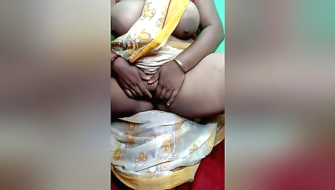 Stunning Indian slut in sexy outfit fingers her pussy
