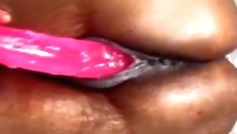 Blonde girl with a long pussy is getting fucked with a dildo