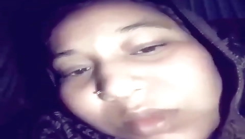 Stunning amateur brunette babe wearing a hot white blouse