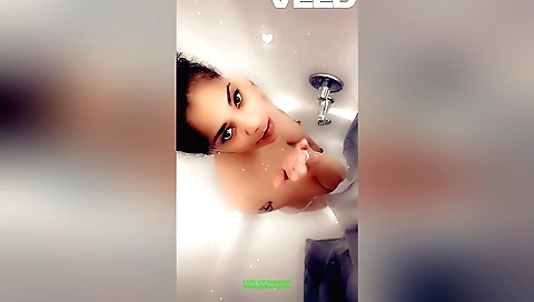Indian woman with a hairy pussy washes her pussy in the shower
