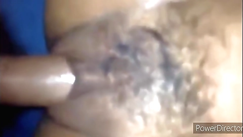 Busty brunette gets her hairy pussy banged with a dildo