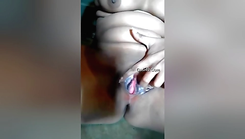 Sexy brunette shows her big boobs and fingering on the webcam