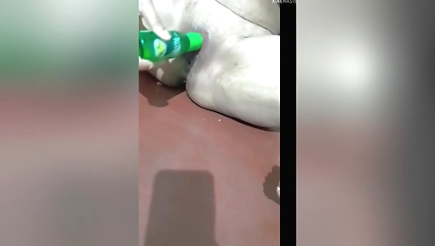 Indian woman with a big dildo plays with it in solo porn