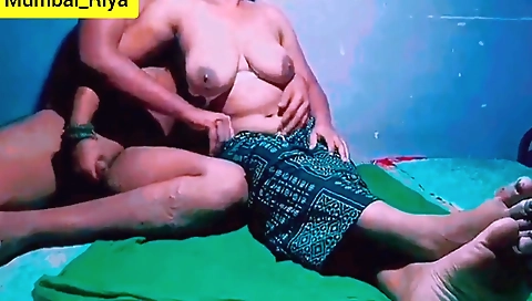 Busty brunette fucks in bed and gets cum on her face