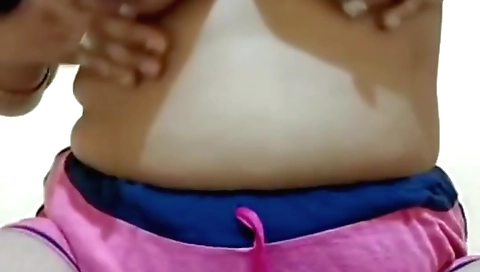 Busty brunette with big tits is showing off in the web camera