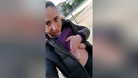 Busty brunette is alone outdoors and making noises