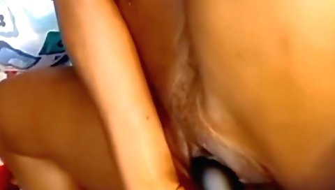 Indian amateur female with large tits sucking dildo