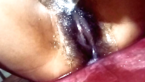 Sexy amateur girl with a sexy mouth and face plays with toy