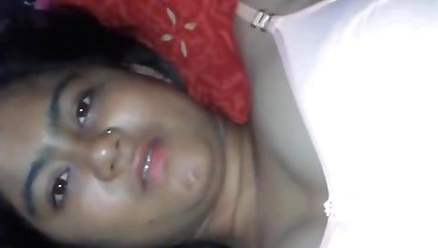 Sexy brunette with a nice face is giving a blowjob