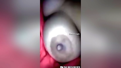 Sexy brunette shows her small tits and ass on webcam