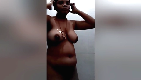 Indian chick shows off her big tits and body in the shower