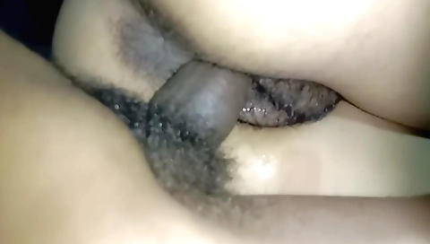 Indian babe is on the table with her hairy pussy and big booty