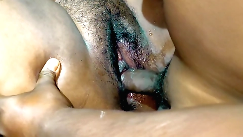 Indian stepmom in a hairy booty gives a blowjob to her stepson