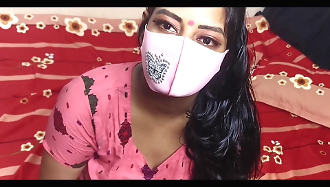 Amateur busty milf gives a blowjob in front of a camera