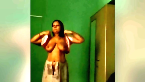 Busty brunette amateur webcam video showing her body