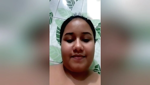 Beautiful brunette babe in her white outfit in solo video