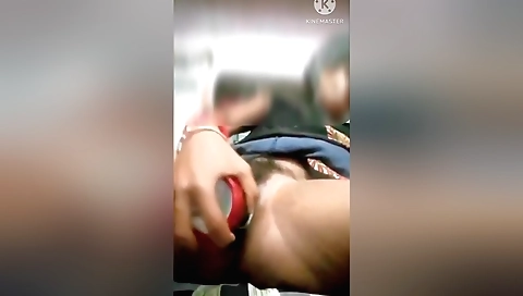 Indian brunette plays with a dildo in the webcam vid