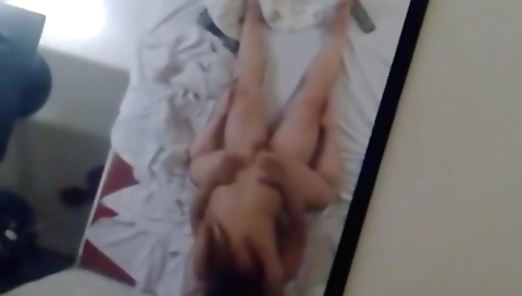 Brunette is playing with her clothes on the webcam