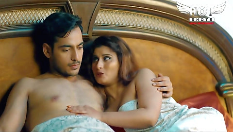 Brunette in red dress and a long hair gets into a threesome