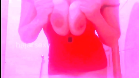 Hot brunette shows her big tits and body on web cam video