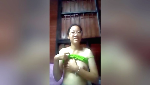 Amateur asian solo girl on the bed with her head on the pillow