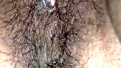 Hairy brunette is getting her pussy stretched and fucked