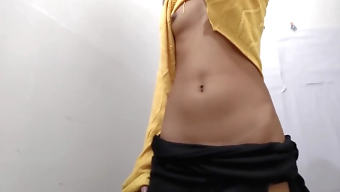 Indian bhabhi in a sexy outfit and wearing a big tushila